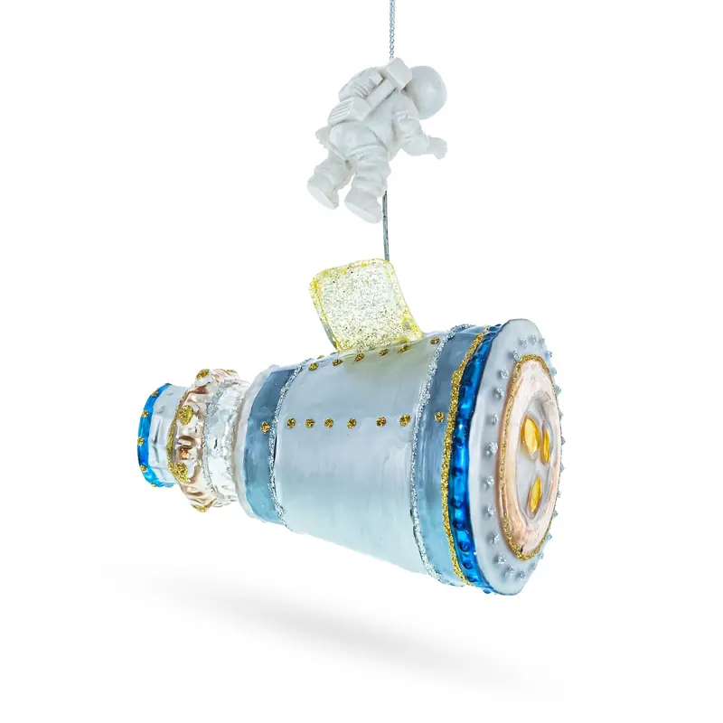 Astronaut in Outer Space Blown Glass Christmas Ornament
